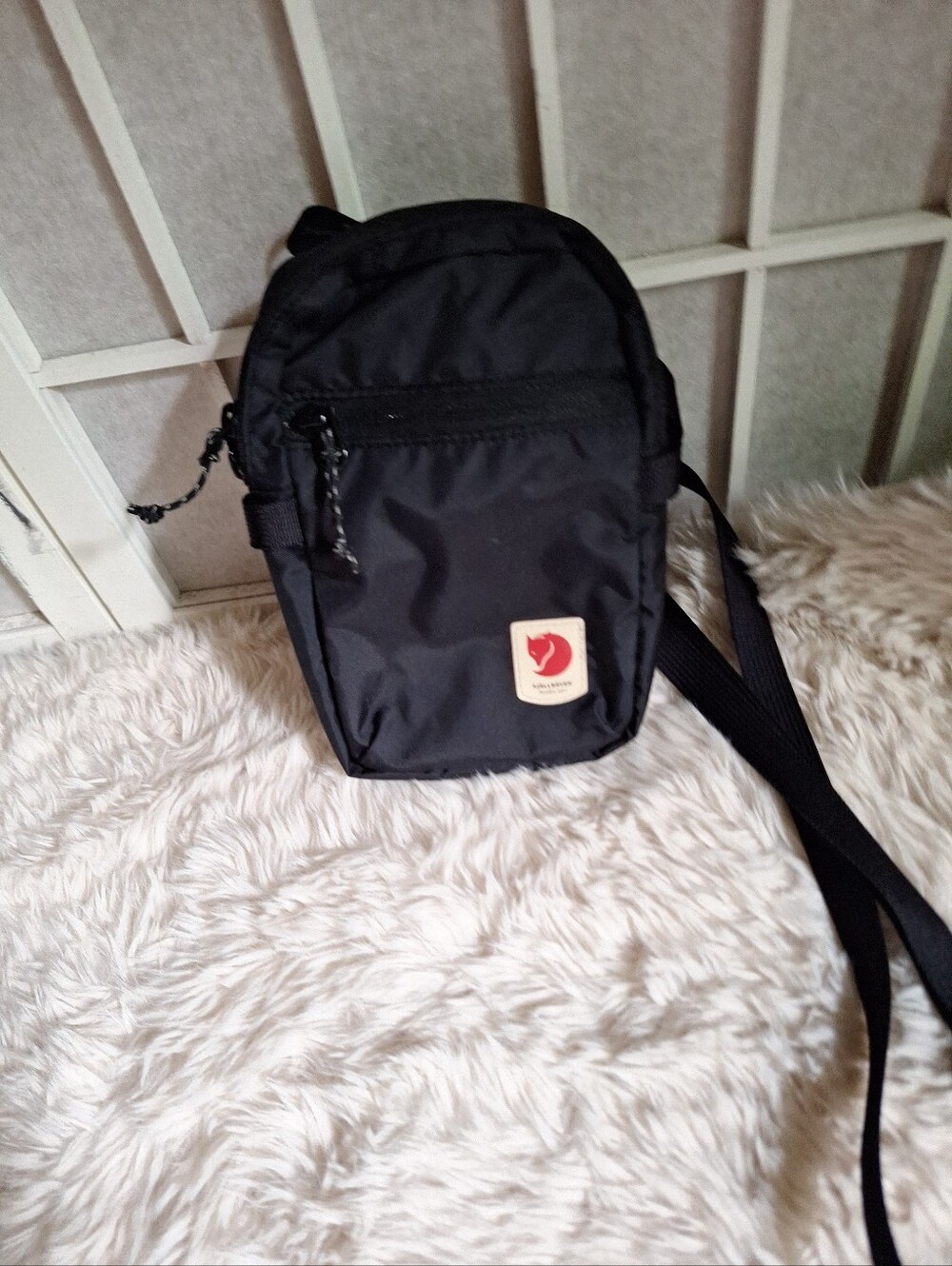 Fjallraven Black High Coast Pocket.